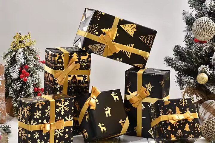 Luxury vintage black and gold Christmas gift wrapping paper rolls