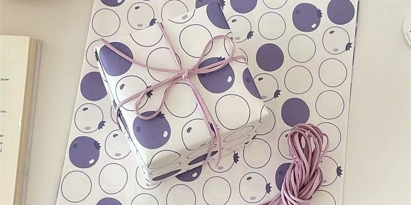 Elegant purple festive wrapping paper for holiday gifts