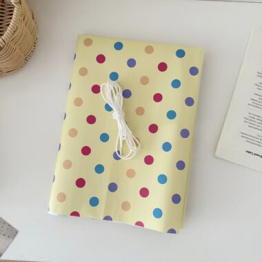 Yellow polka dot kraft wrapping paper for gift packaging