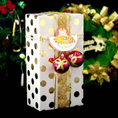 Foil dotted Christmas wrapping paper with metallic shine