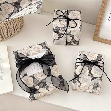 Luxury black camellia romantic festival gift wrapping paper