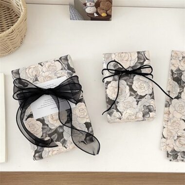 Luxury black camellia romantic festival gift wrapping paper