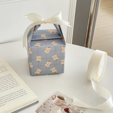 Cute bear grid gift wrapping paper with playful pattern