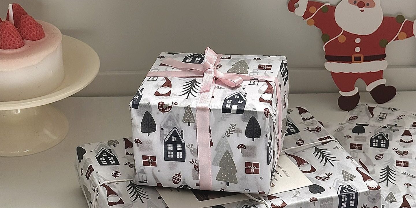 Nordic snow house Christmas wrapping paper for festive gifts