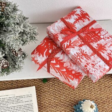 Red cedar Christmas wrapping paper with festive winter atmosphere
