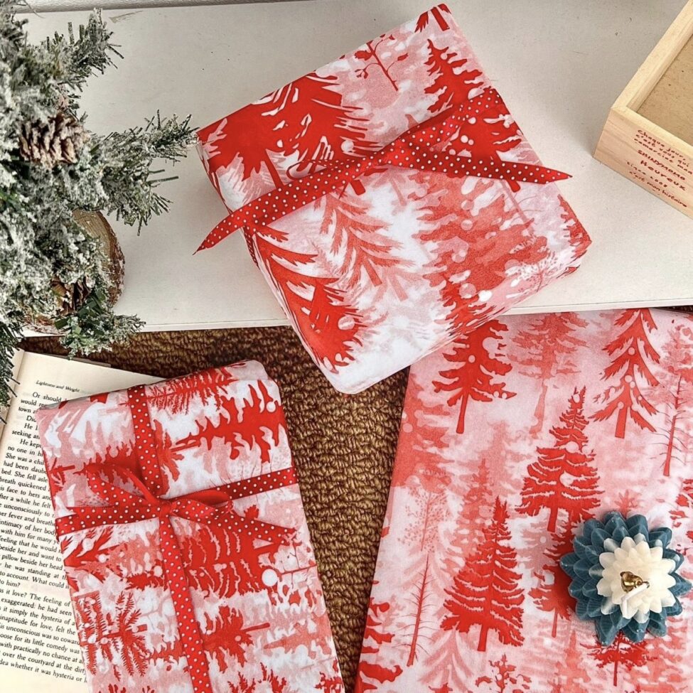 Red cedar Christmas wrapping paper with festive winter atmosphere